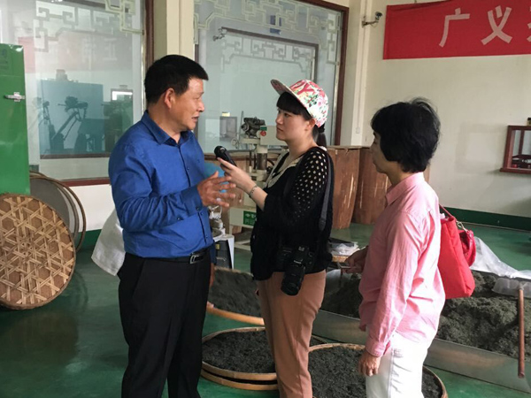 中國國際廣播電臺(tái)副總編輯任謙等廣電領(lǐng)導(dǎo)同志考察廣義茶印象園